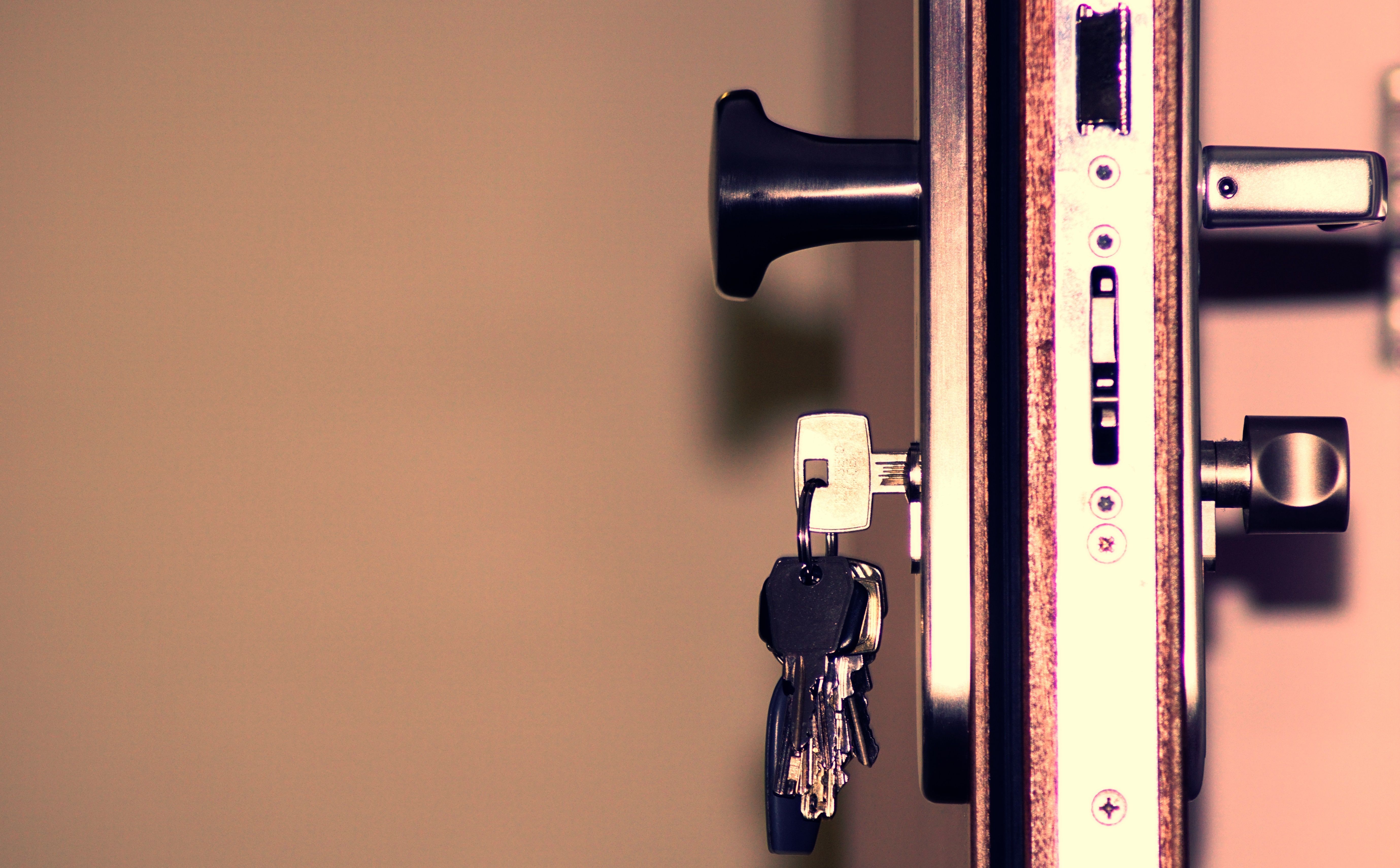 Door lock and keys emphasizing the importance of strong physical access control.